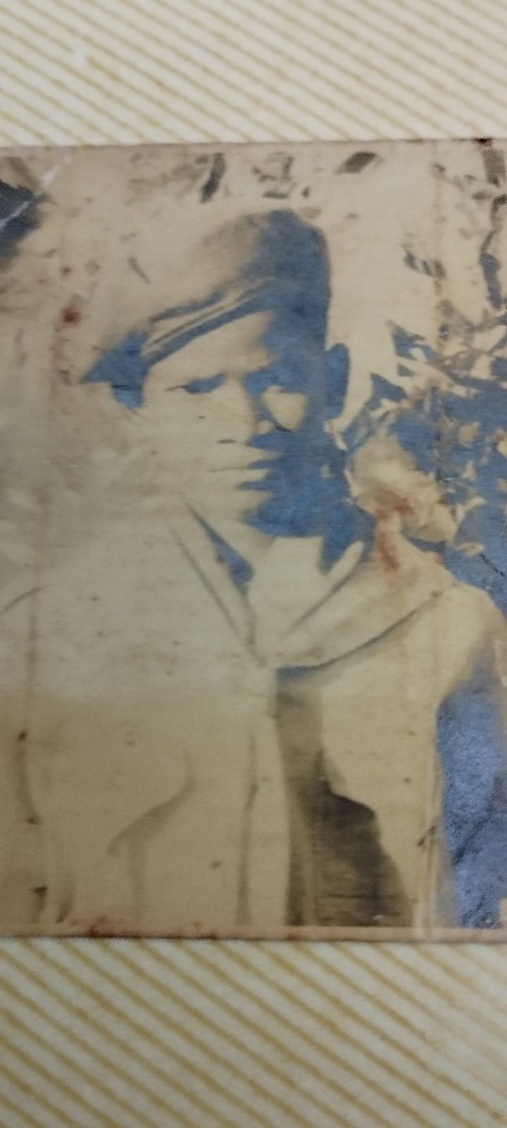 In scout 's uniform in high school. Uncle in scout 's uniform in high school.